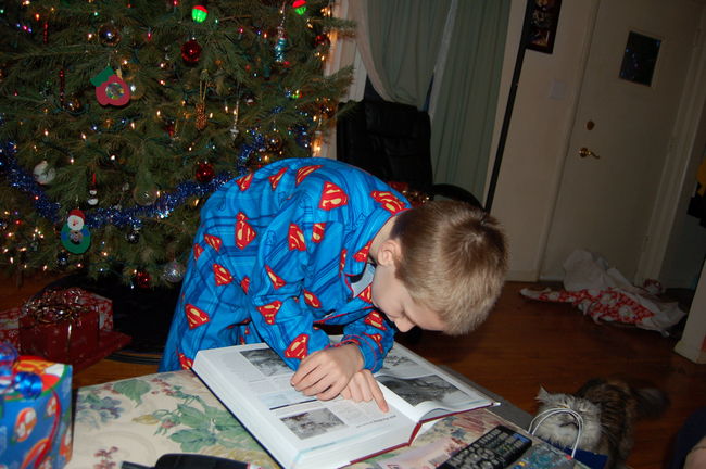 James reading his tank book
Keywords: James Christmas