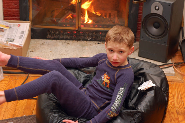 James in front of the fire
Recovering from playing outside in the snow and freezing his feet!
Keywords: James