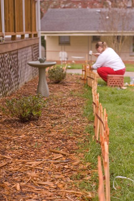Julie installing the garden fence
Keywords: garden fence julie
